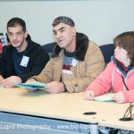 Three people speaking at the self-advocacy meeting in Israel