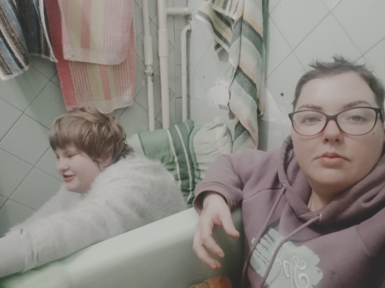 Family and daughter, sheltering in a bathroom